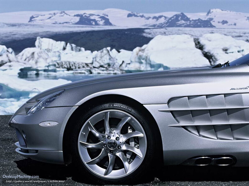 Silver sports car in icy landscape