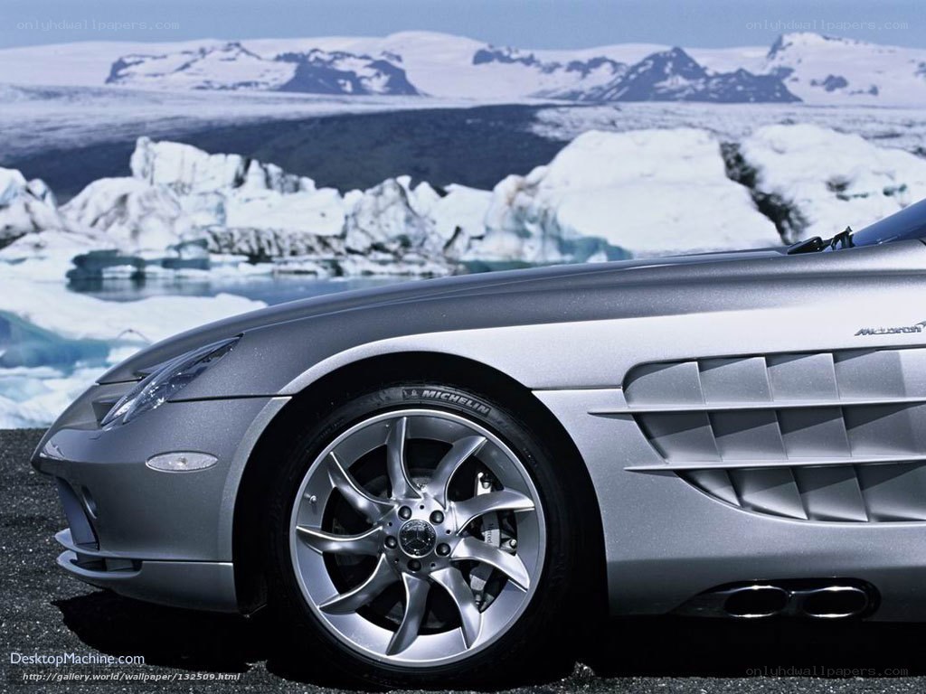 Silver sports car in icy landscape