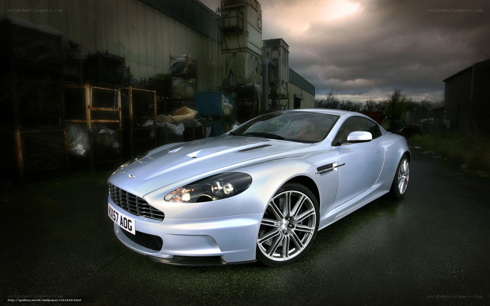 silver sports car in industrial setting
