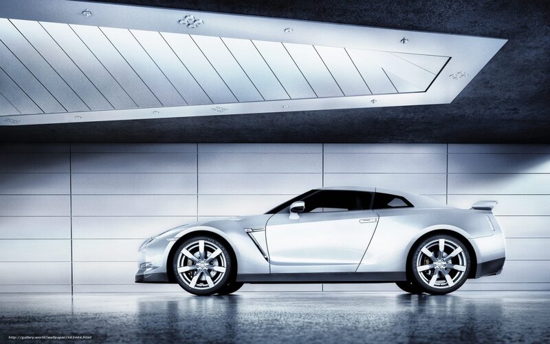 Silver sports car in modern garage