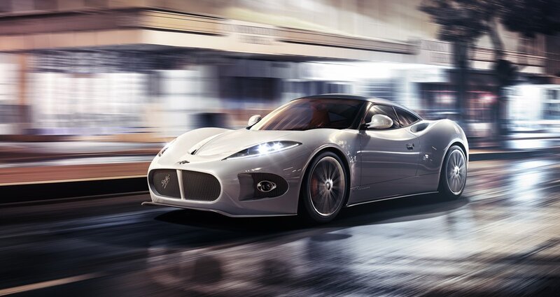 silver sports car in motion