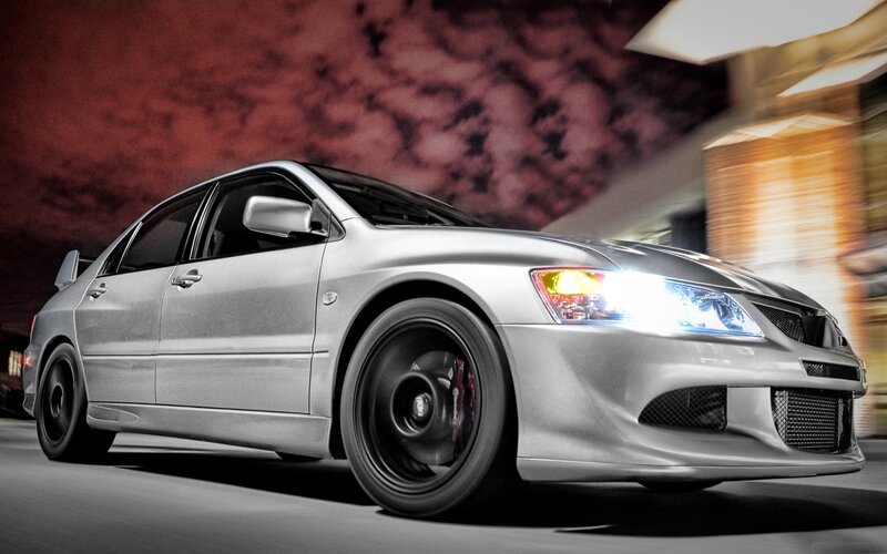 silver sports car in motion