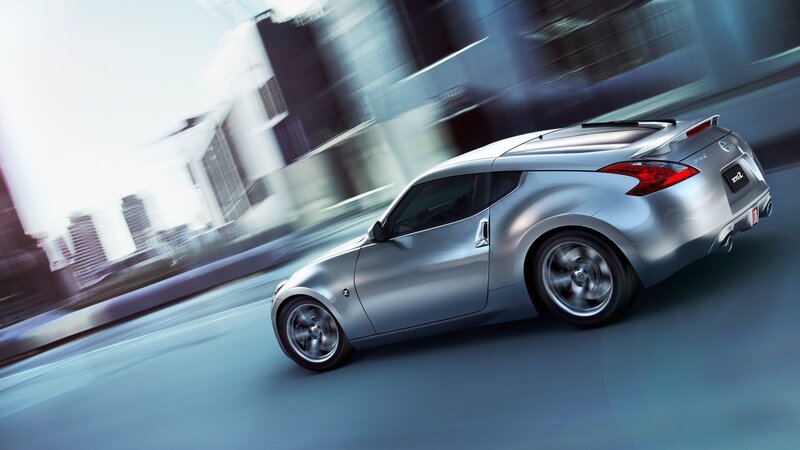 silver sports car in motion