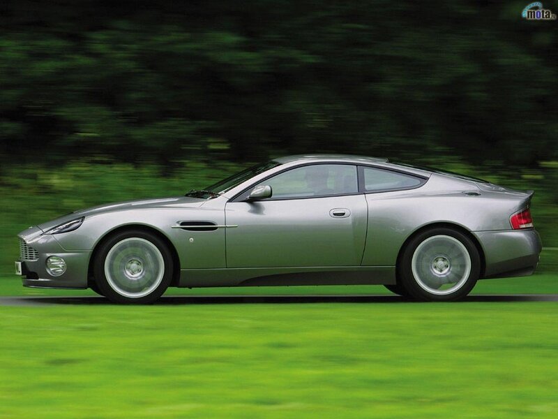 silver sports car in motion