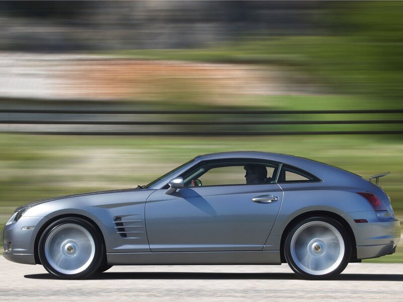 silver sports car in motion