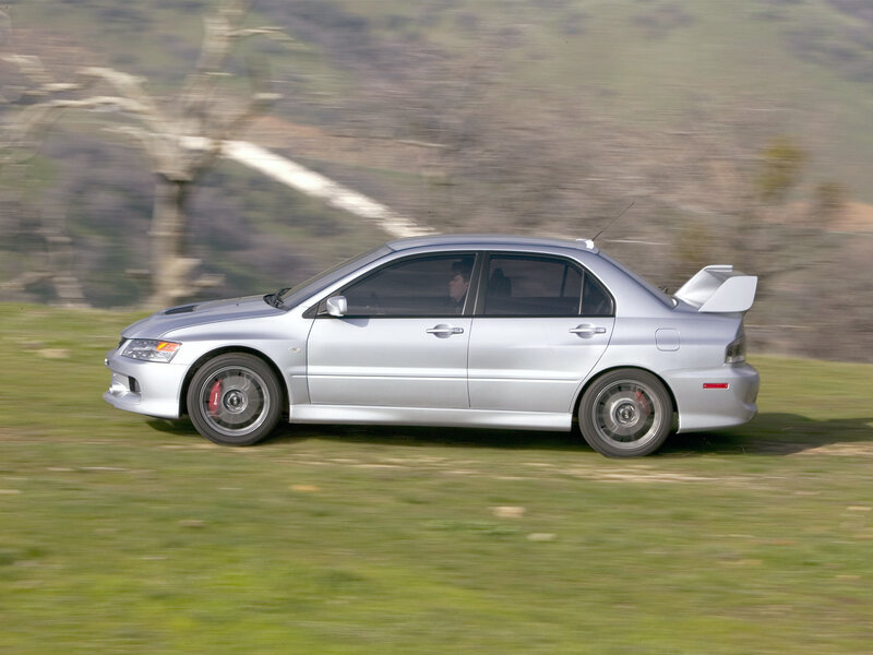 silver sports car in motion