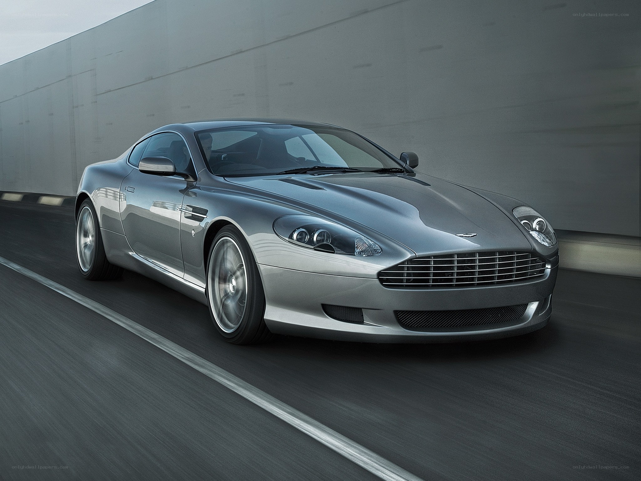 silver sports car in motion