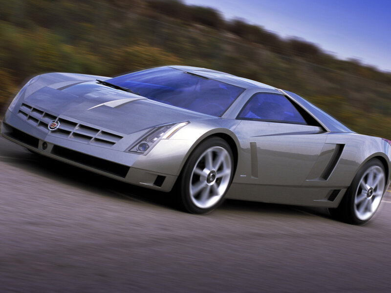 silver sports car in motion