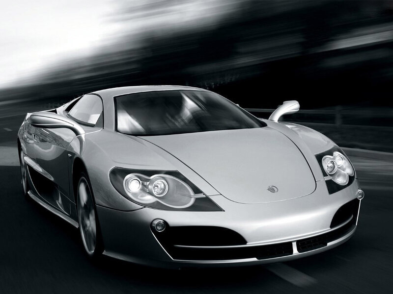 silver sports car in motion