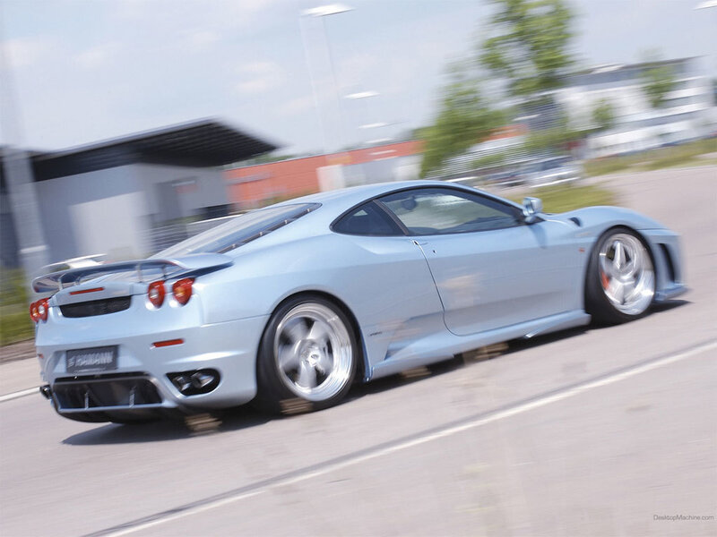 silver sports car in motion