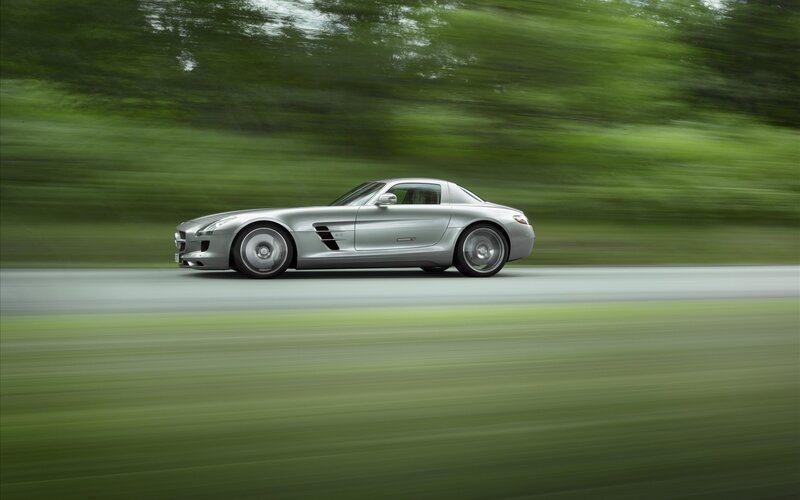 silver sports car in motion