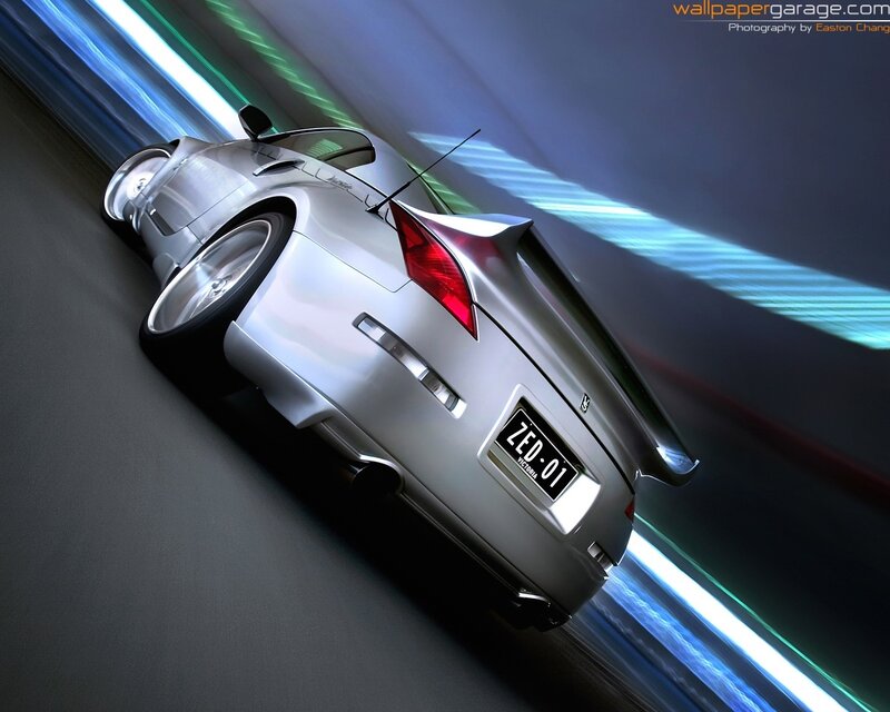silver sports car in motion