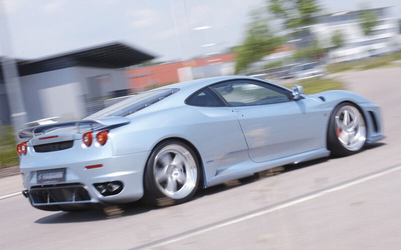 silver sports car in motion