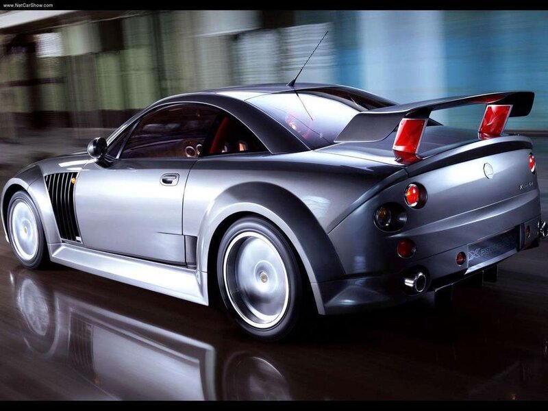 silver sports car in motion