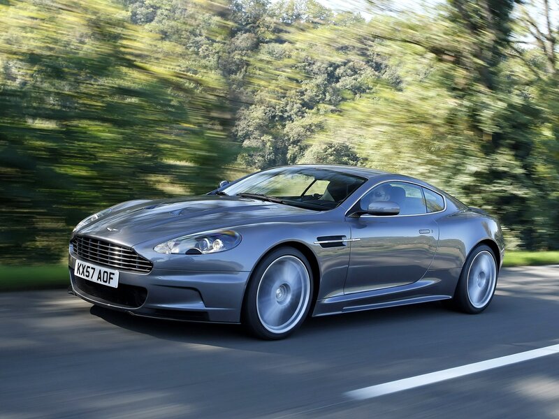 silver sports car in motion