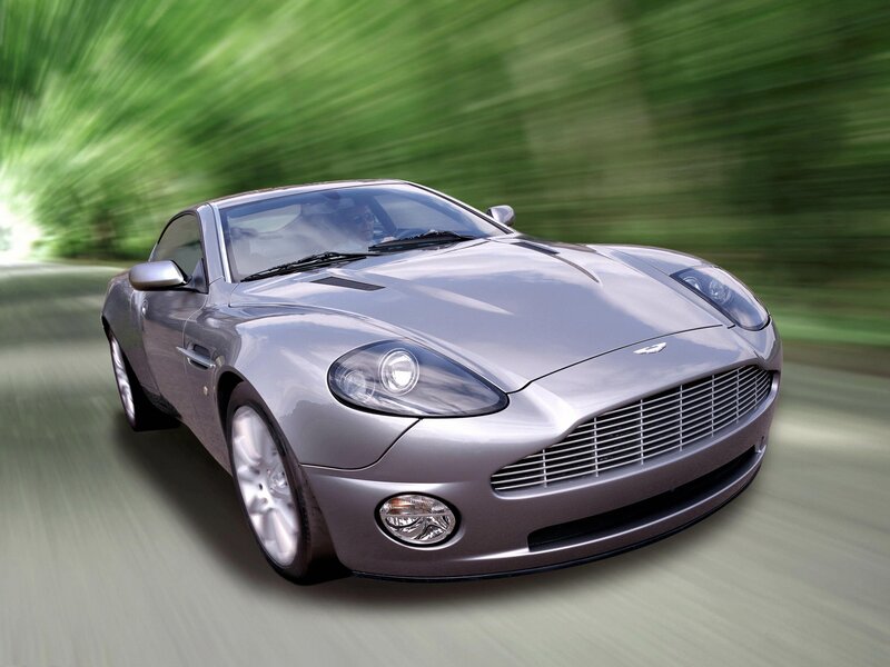 silver sports car in motion