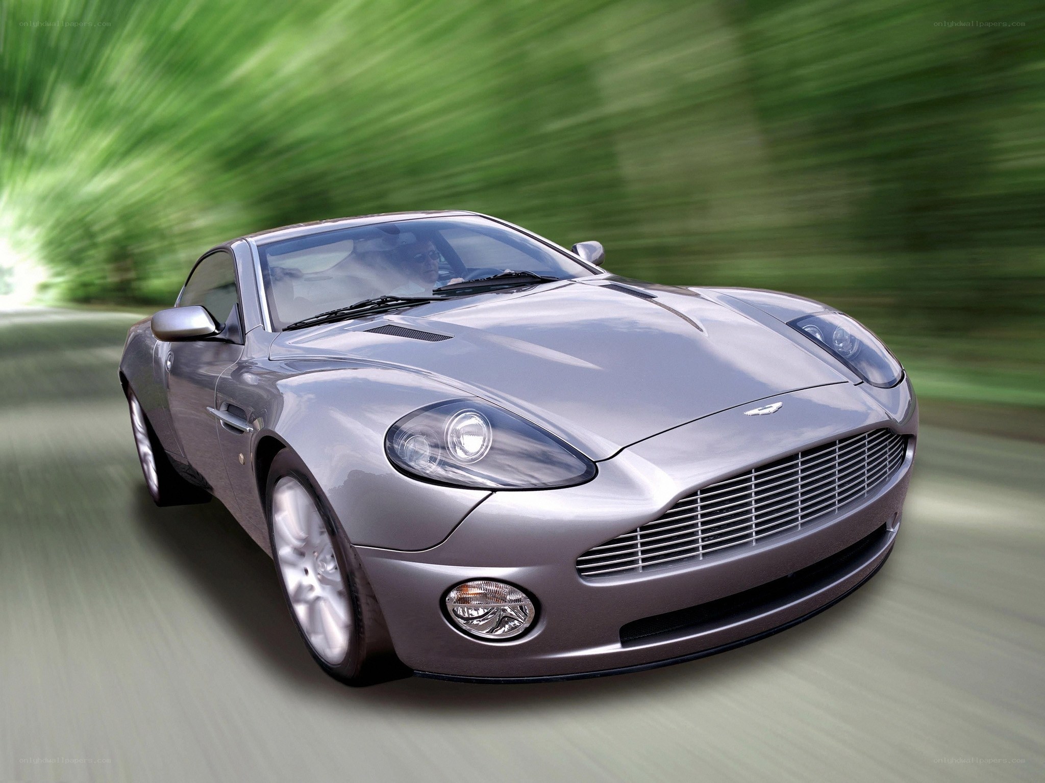 silver sports car in motion