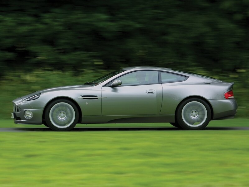 silver sports car in motion