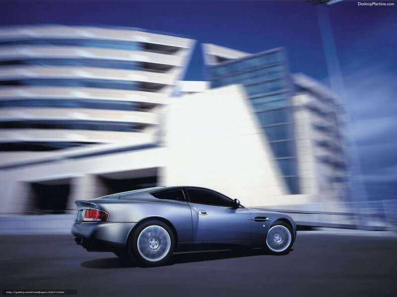 silver sports car in motion