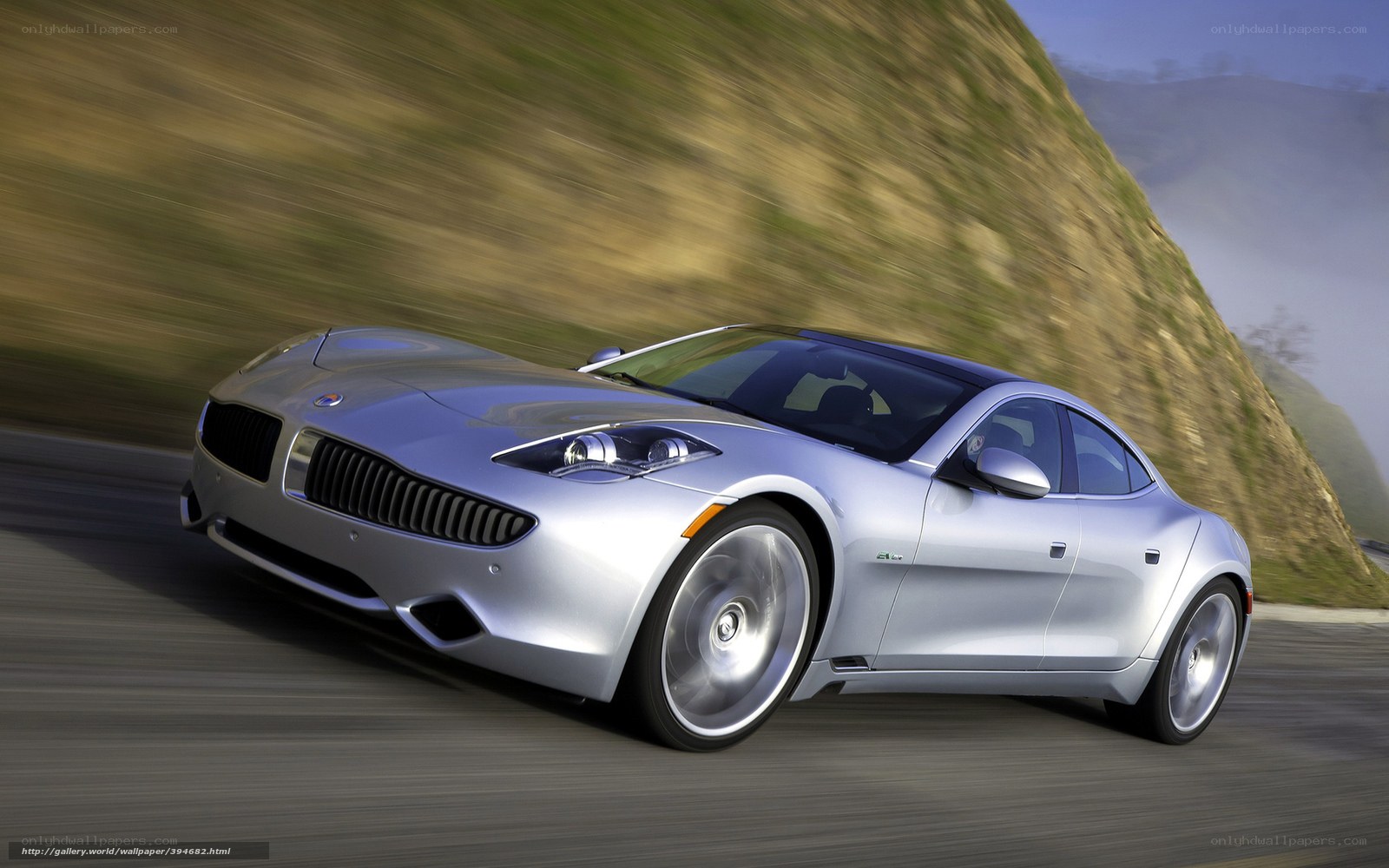 silver sports car in motion
