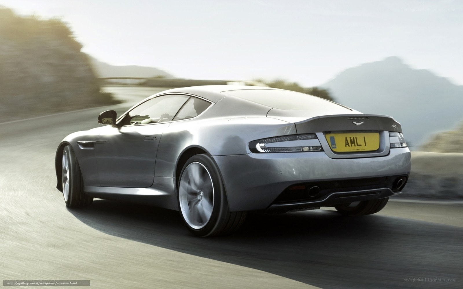 silver sports car in motion