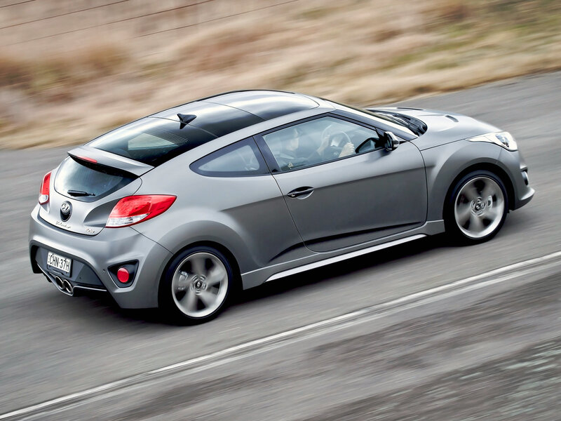 silver sports car in motion