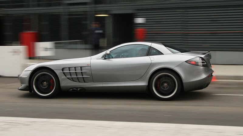 silver sports car in motion