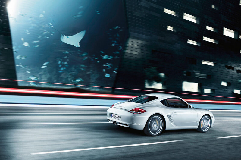 Silver sports car in motion
