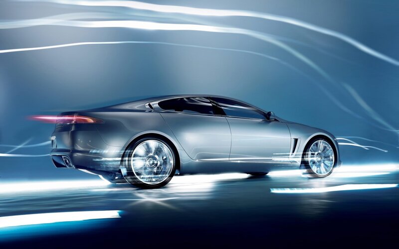 silver sports car in motion