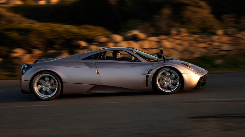 silver sports car in motion