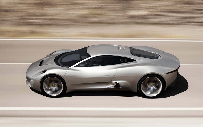 silver sports car in motion