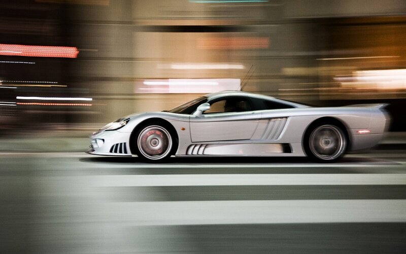 silver sports car in motion
