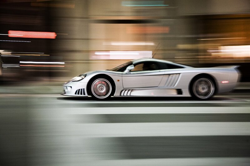 silver sports car in motion