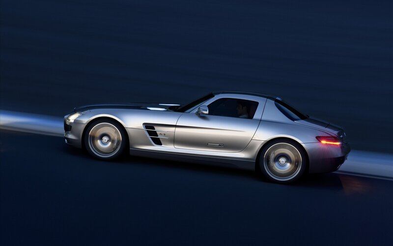 silver sports car in motion