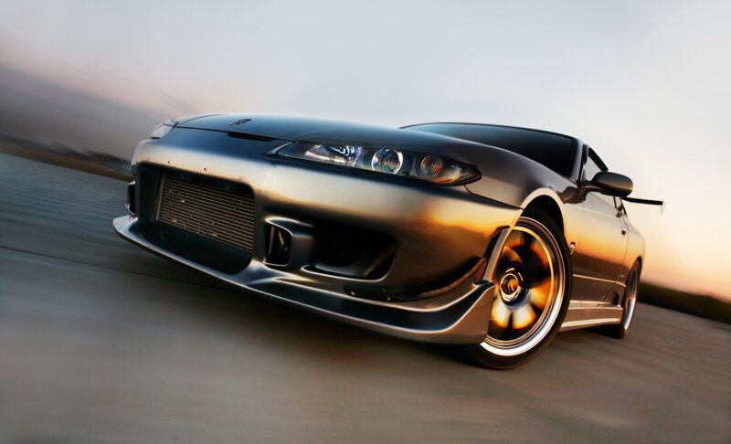 silver sports car in motion