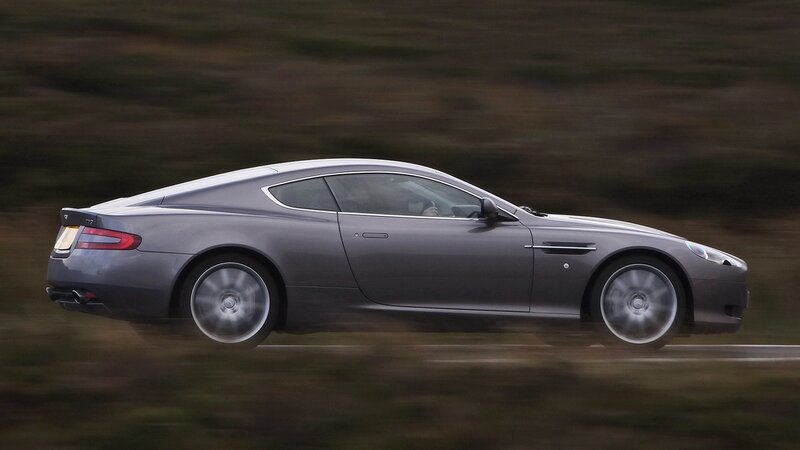 silver sports car in motion