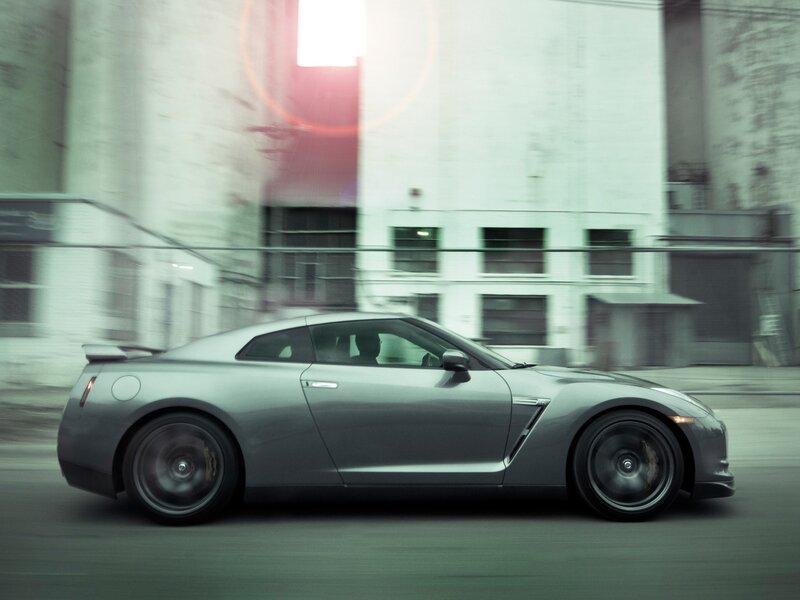 silver sports car in motion