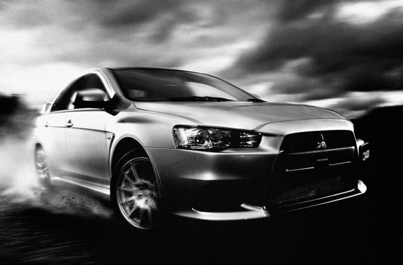 silver sports car in motion