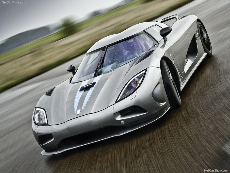 silver sports car in motion