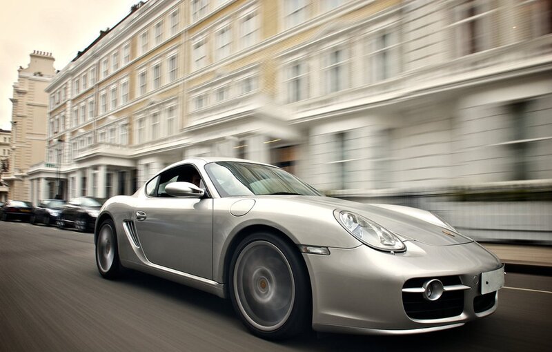 silver sports car in motion
