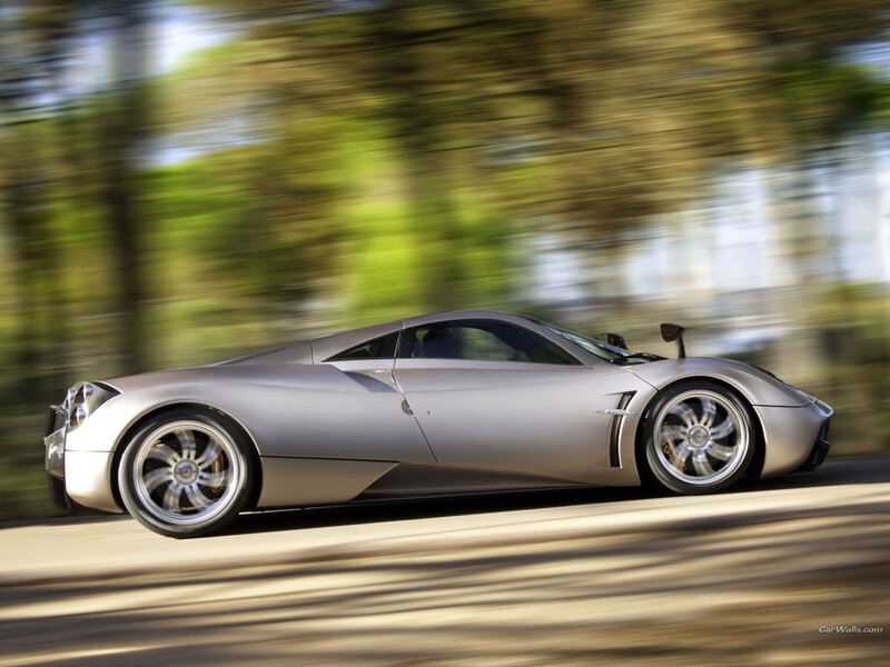 silver sports car in motion