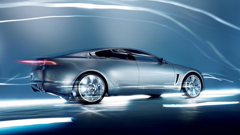 silver sports car in motion