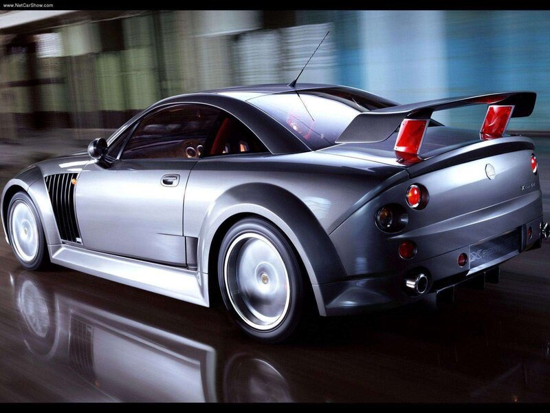 silver sports car in motion