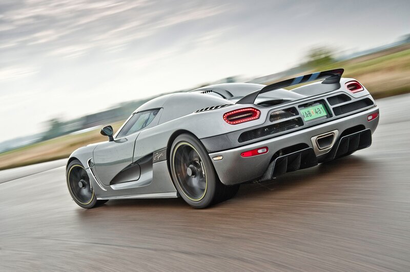silver sports car in motion