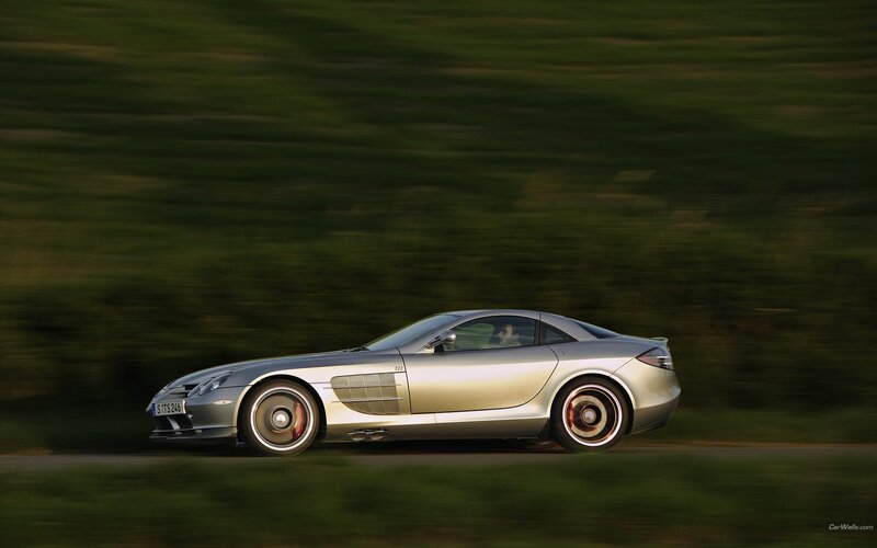 silver sports car in motion