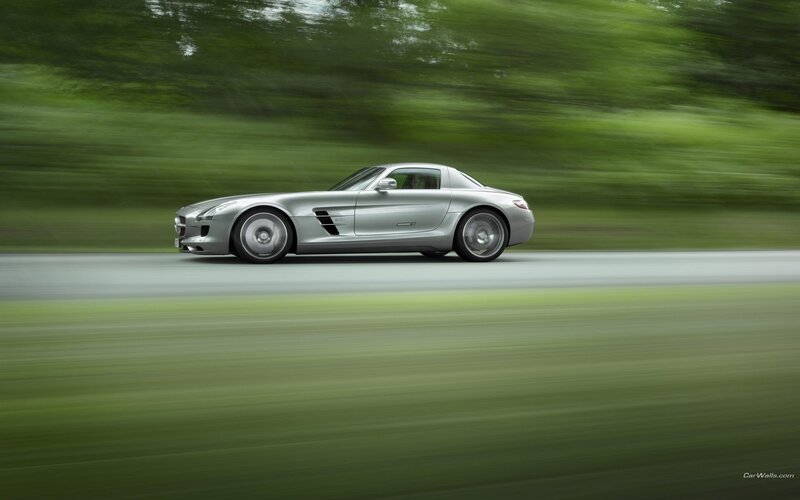 silver sports car in motion