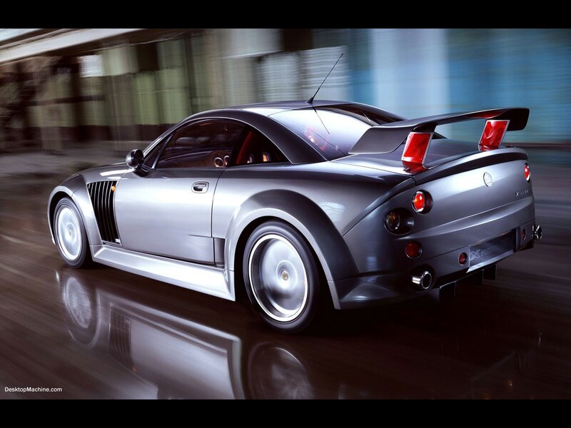 silver sports car in motion