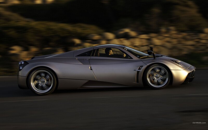 silver sports car in motion