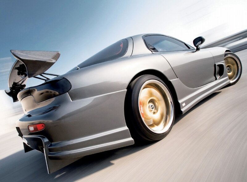 silver sports car in motion