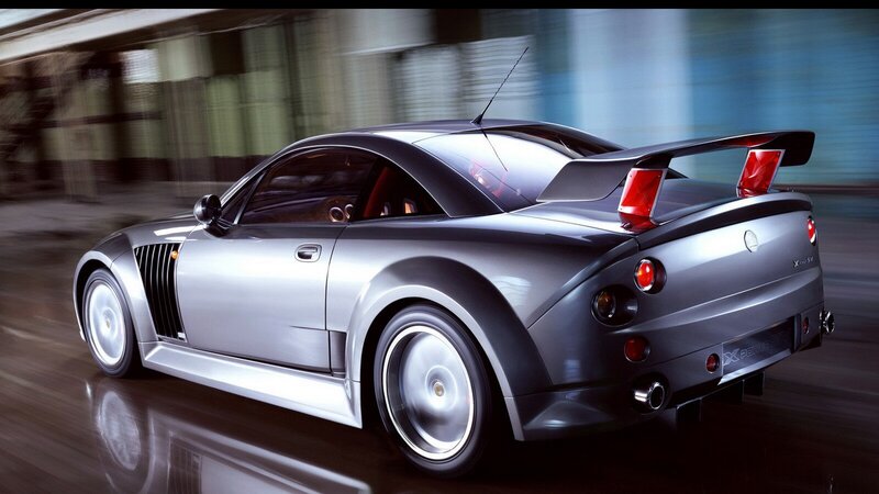 silver sports car in motion